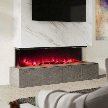 3-sided electric fireplace with vibrant red flames, set within a modern media wall featuring a marble finish, ideal for cozy living spaces.