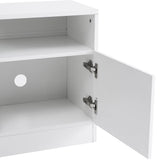 detail of white electric fireplace with storage cabinets